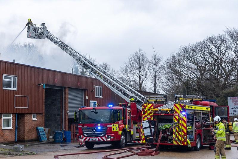 two fire engines at an industrial fire