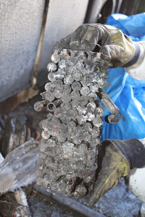 The remains of an e-scooter battery pack which caught fire at a flat in Sheppey