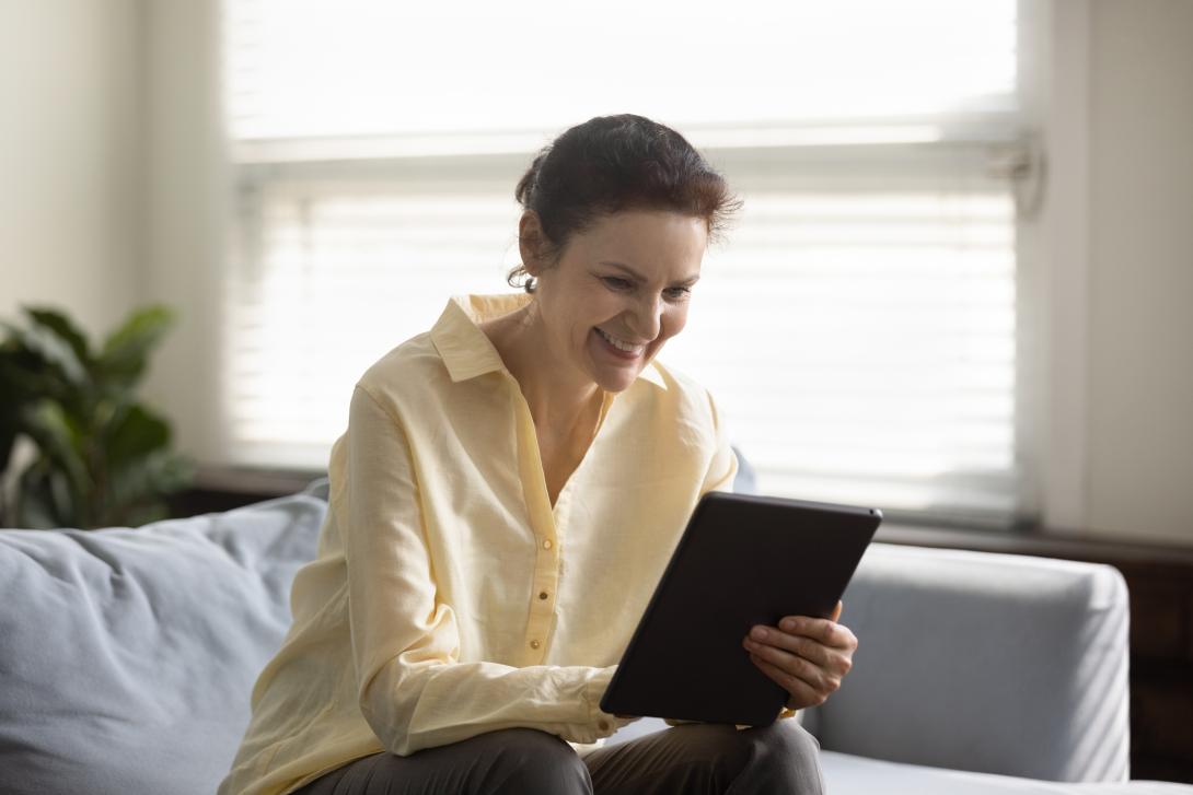 Woman looking at tablet