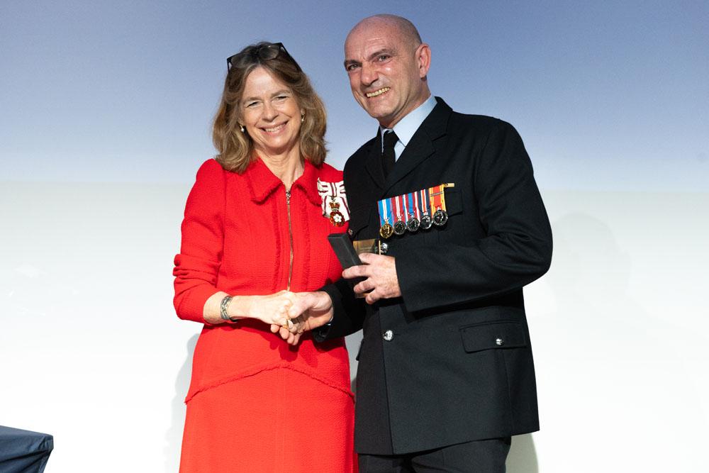 Firefighter Jeff receives an award