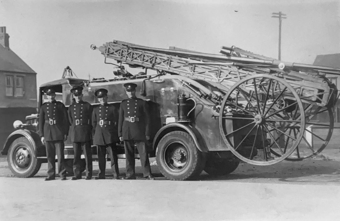 The crews with one of the fire trucks during WW2