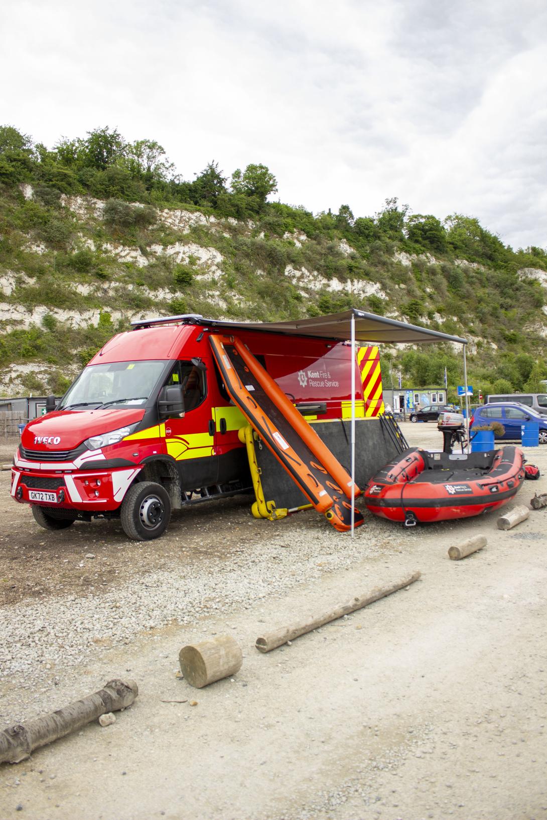 The new water rescue vehicle, with all the equipment to the side of it including an inflatable boat and platform